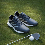 Zapato Adidas Traxion Response Spike 26