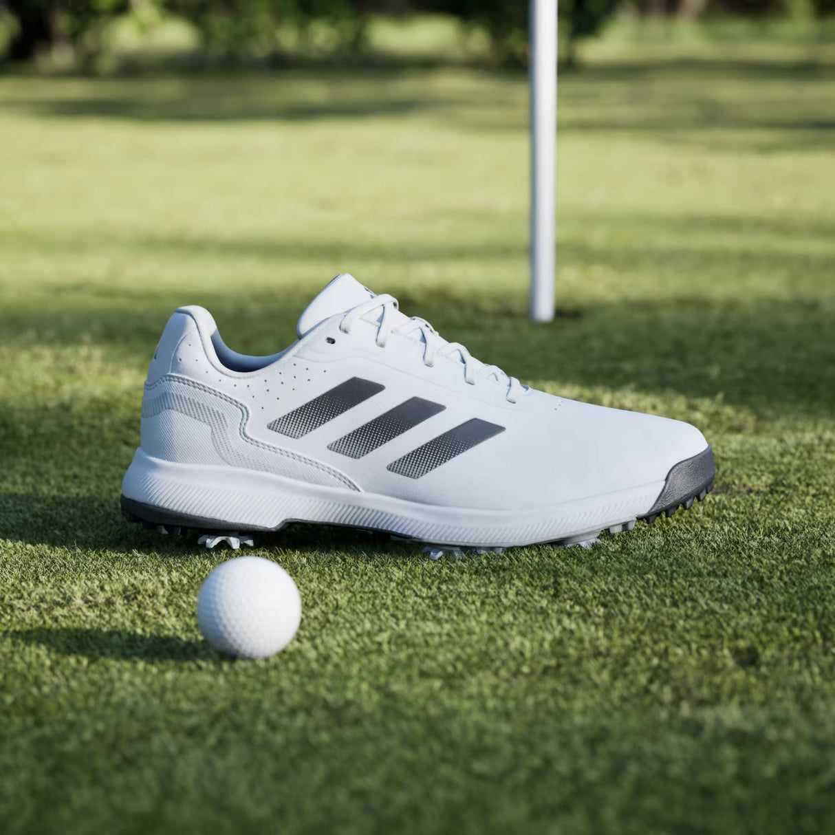 Zapato Adidas Traxion Response Spike 26