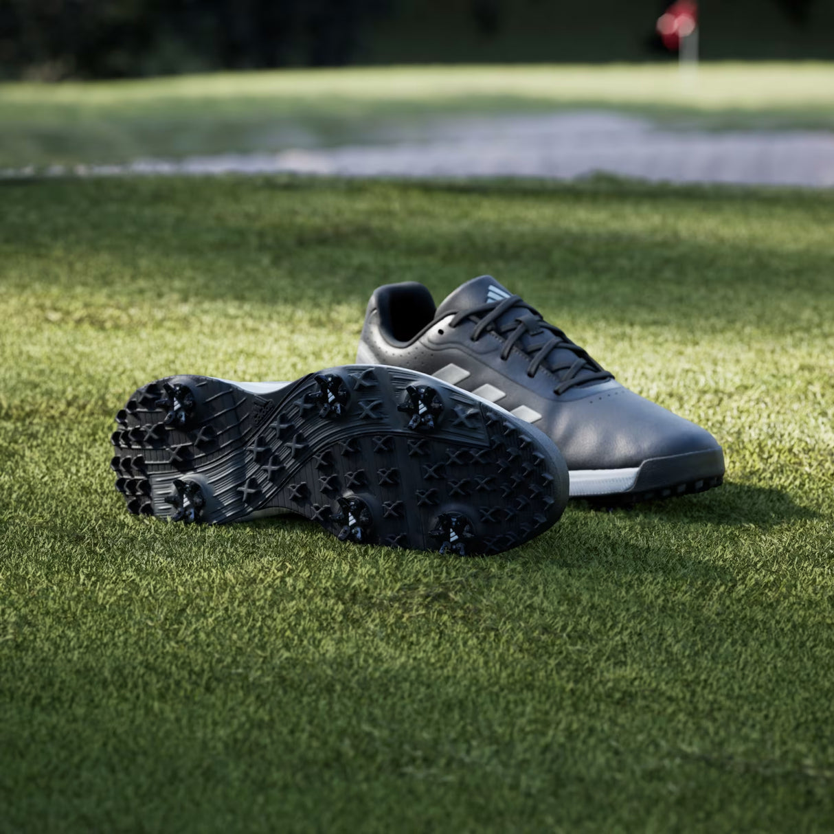 Zapato Adidas Traxion Response Spike 26